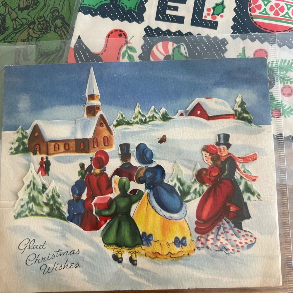 Bundle of vintage Christmas wrapping papers and card